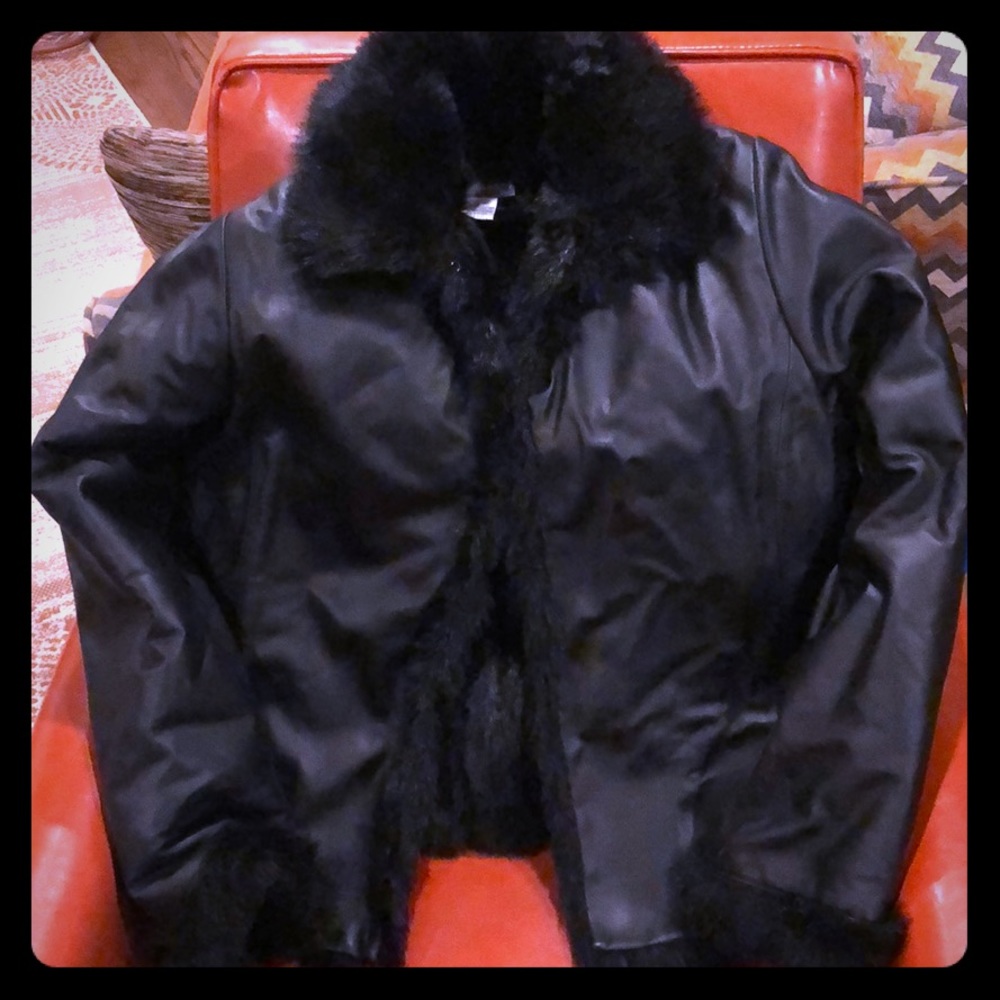 Black leather coat with faux fur lining.